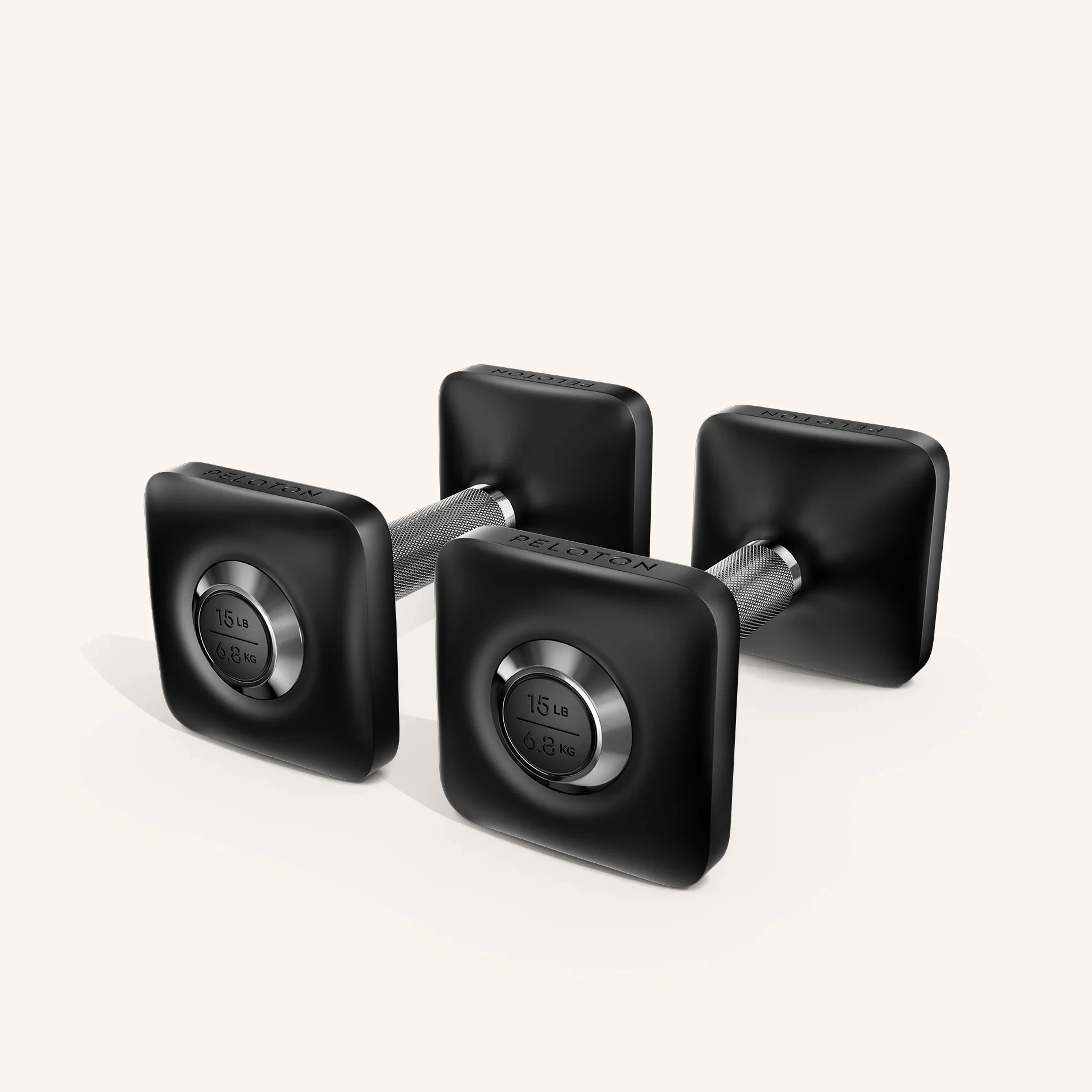 A pair of 15-pound Peloton dumbbells as part of a list of Peloton Bike accessories.