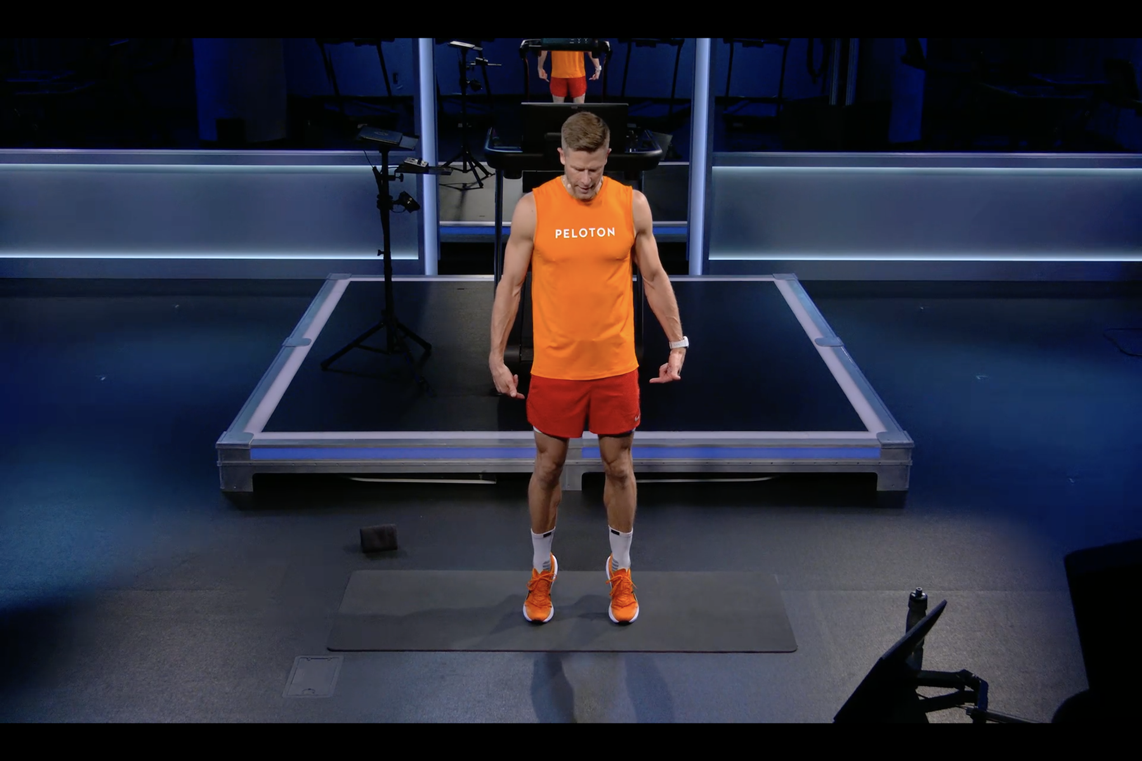 Man does calf raises as an ankle strengthening exercise