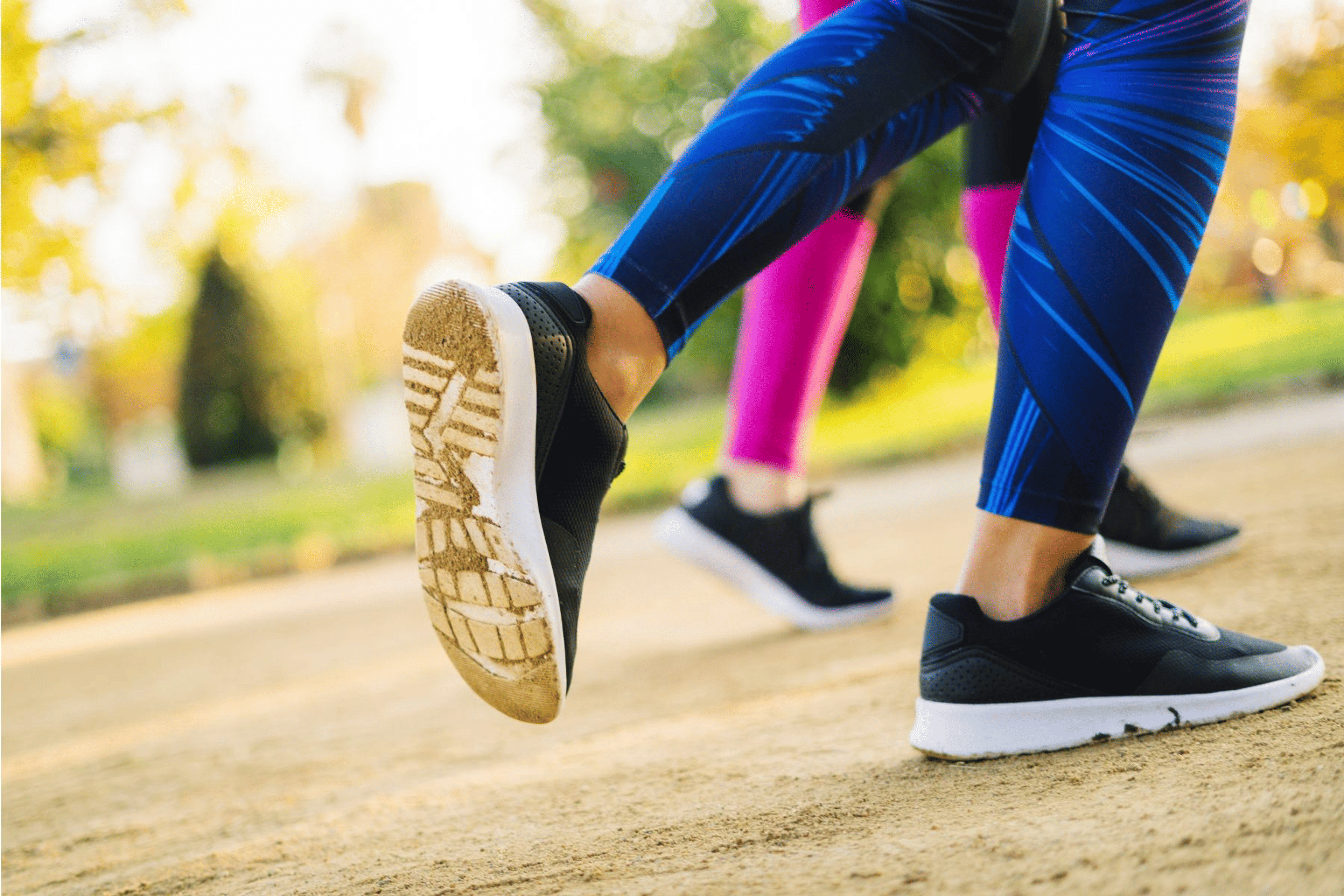 Feet of people running outside