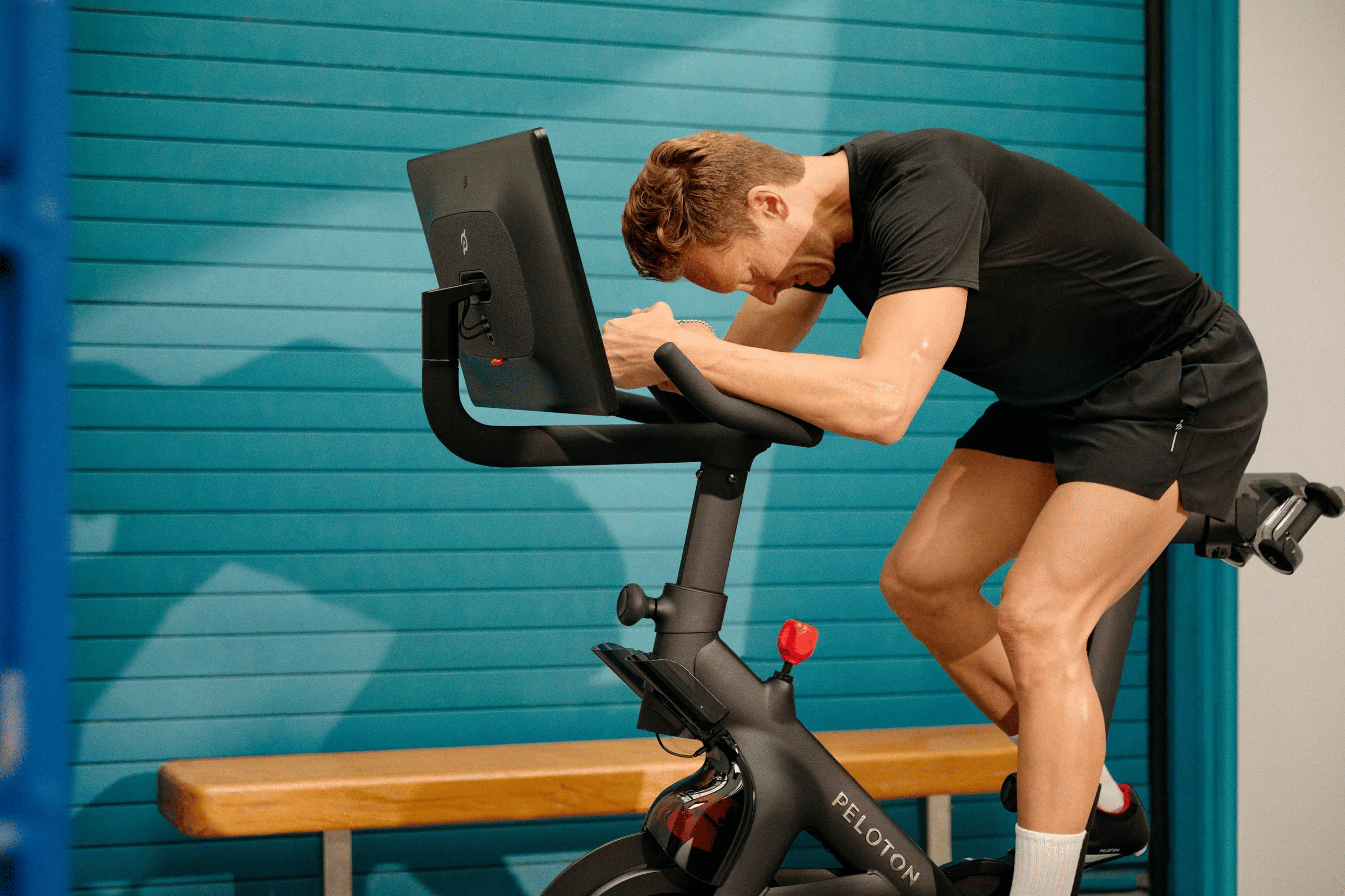 Man takes his first Peloton Bike class as a beginner