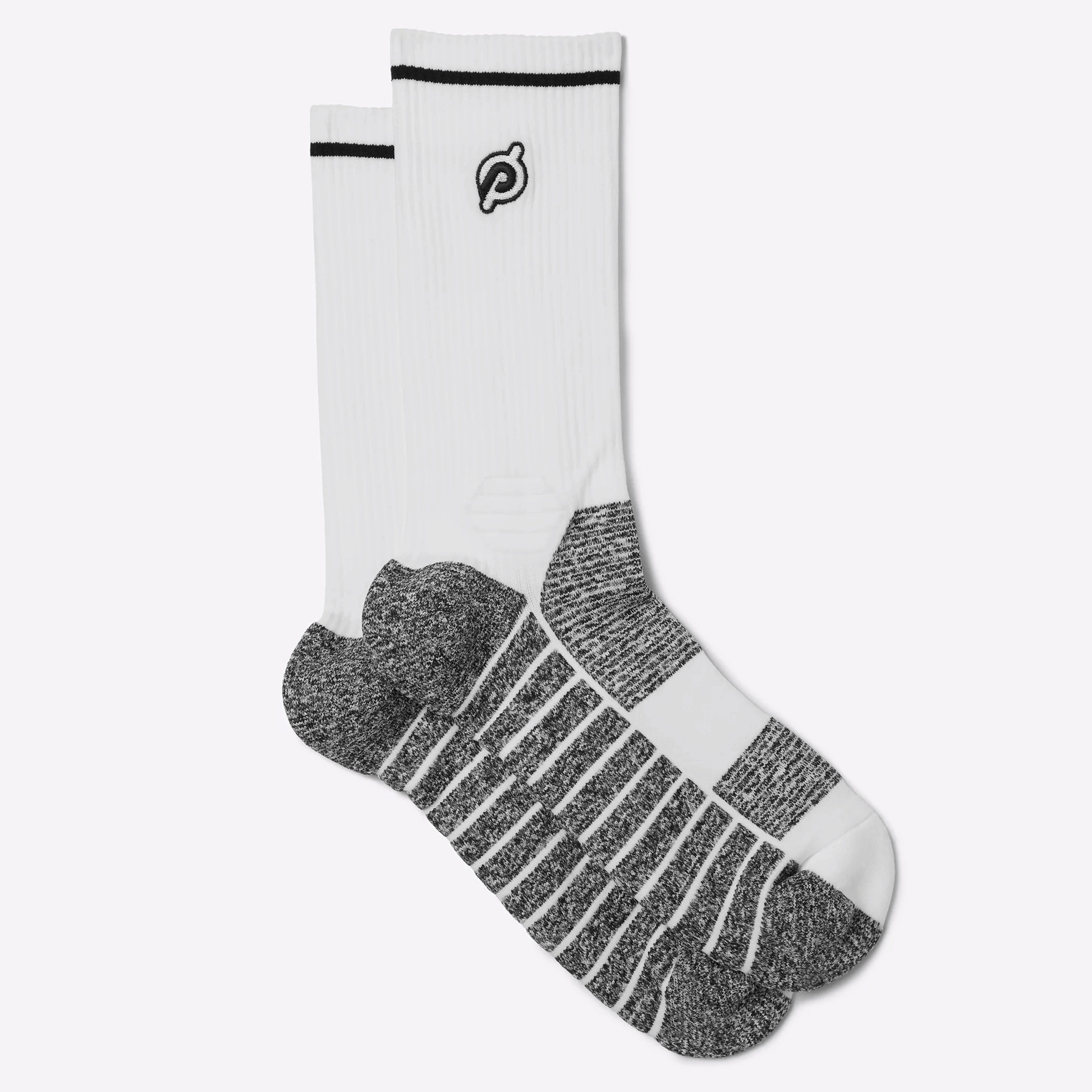 A pair of Peloton workout crew socks as part of a list of Peloton Bike Accessories.