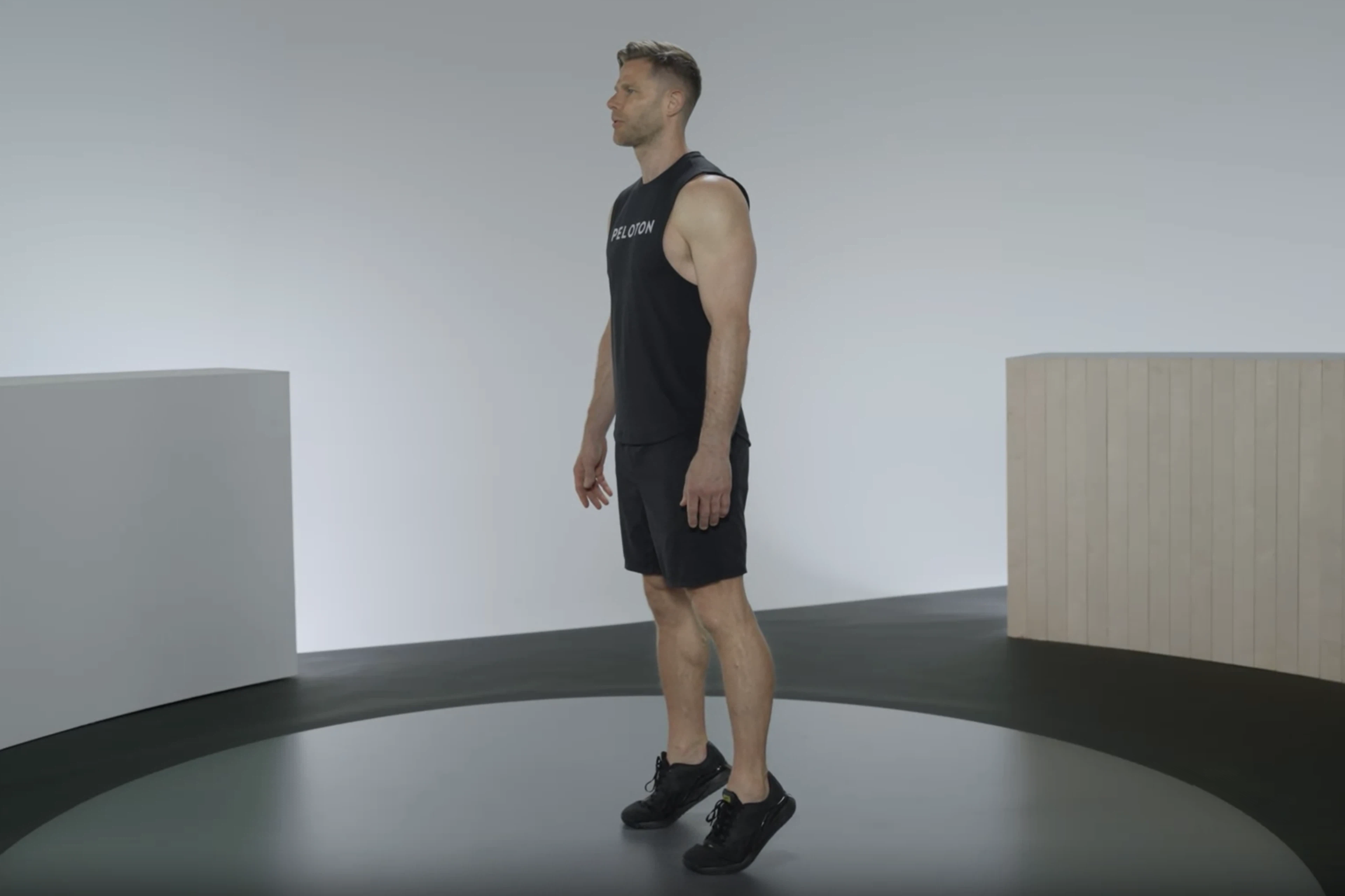 Man does a calf raise, leg exercises for beginners