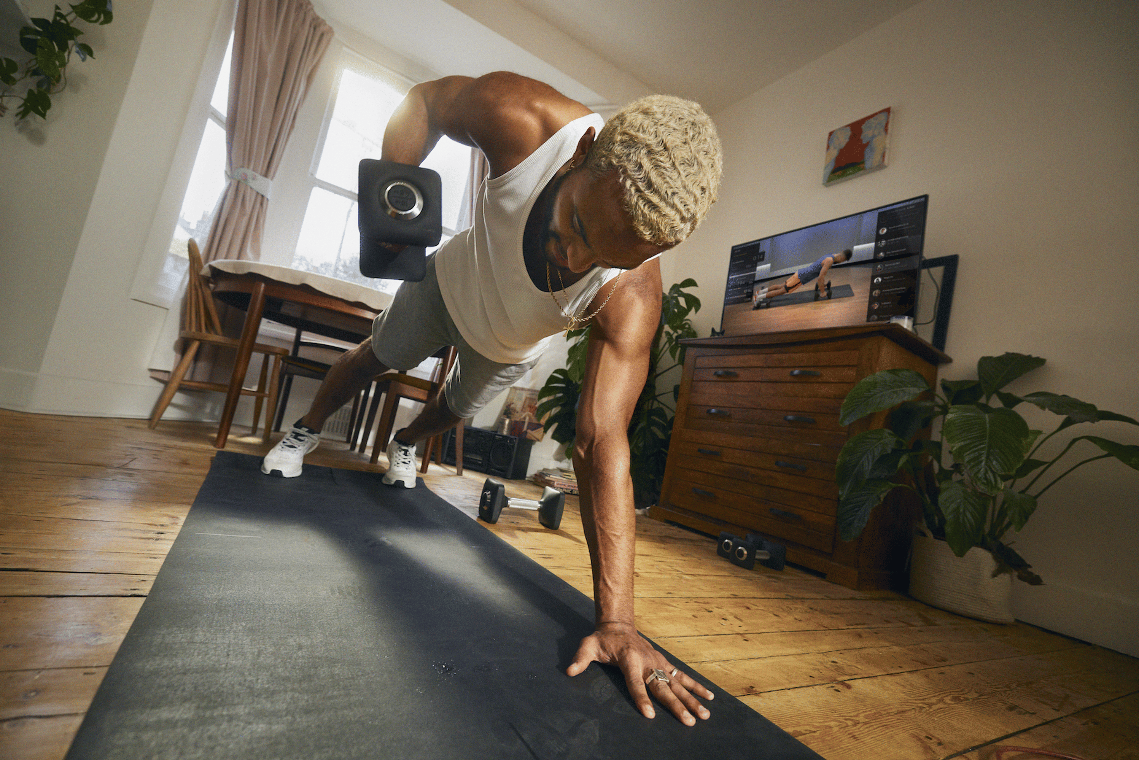 man doing dumbbell rows