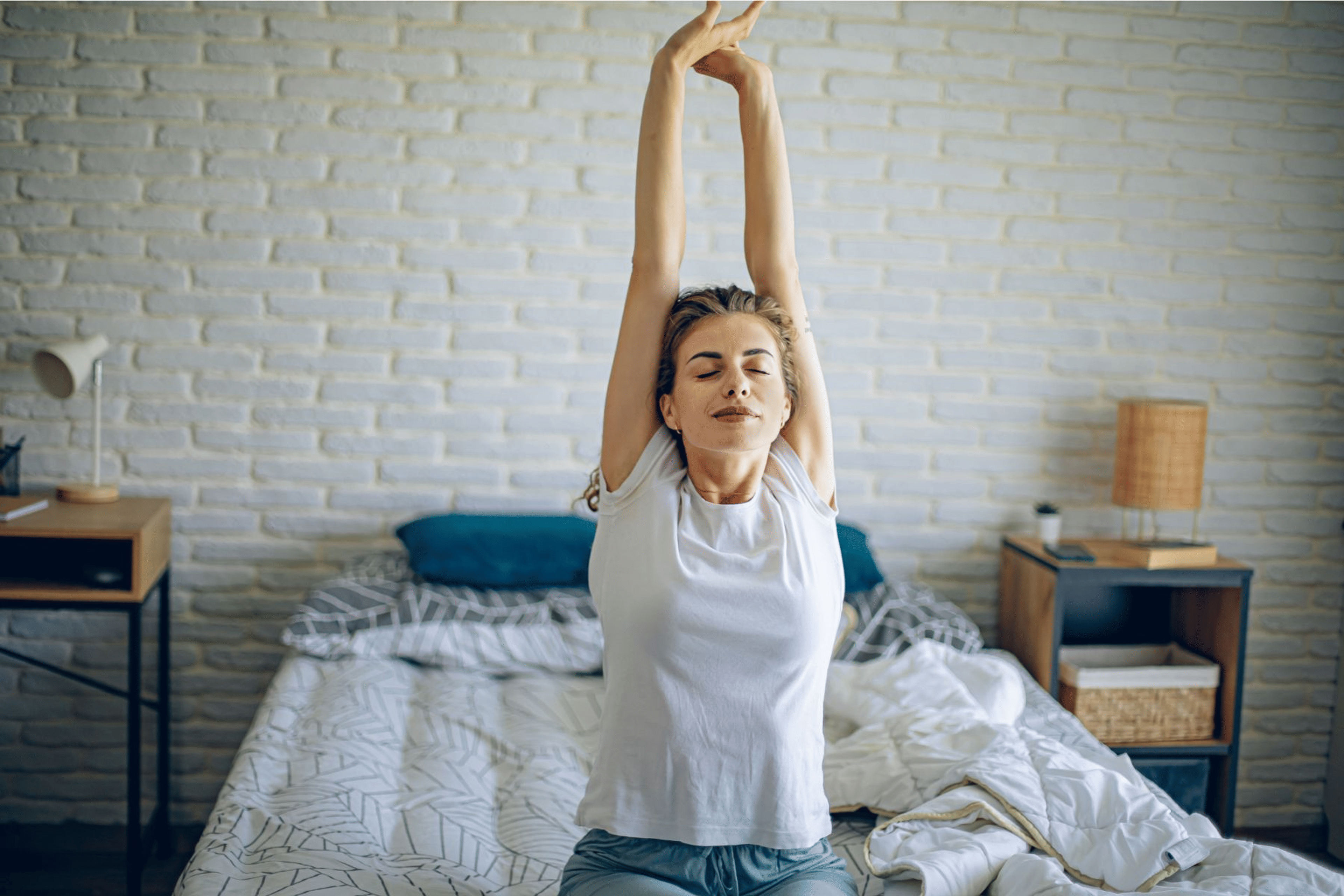 Woman stretching on bed