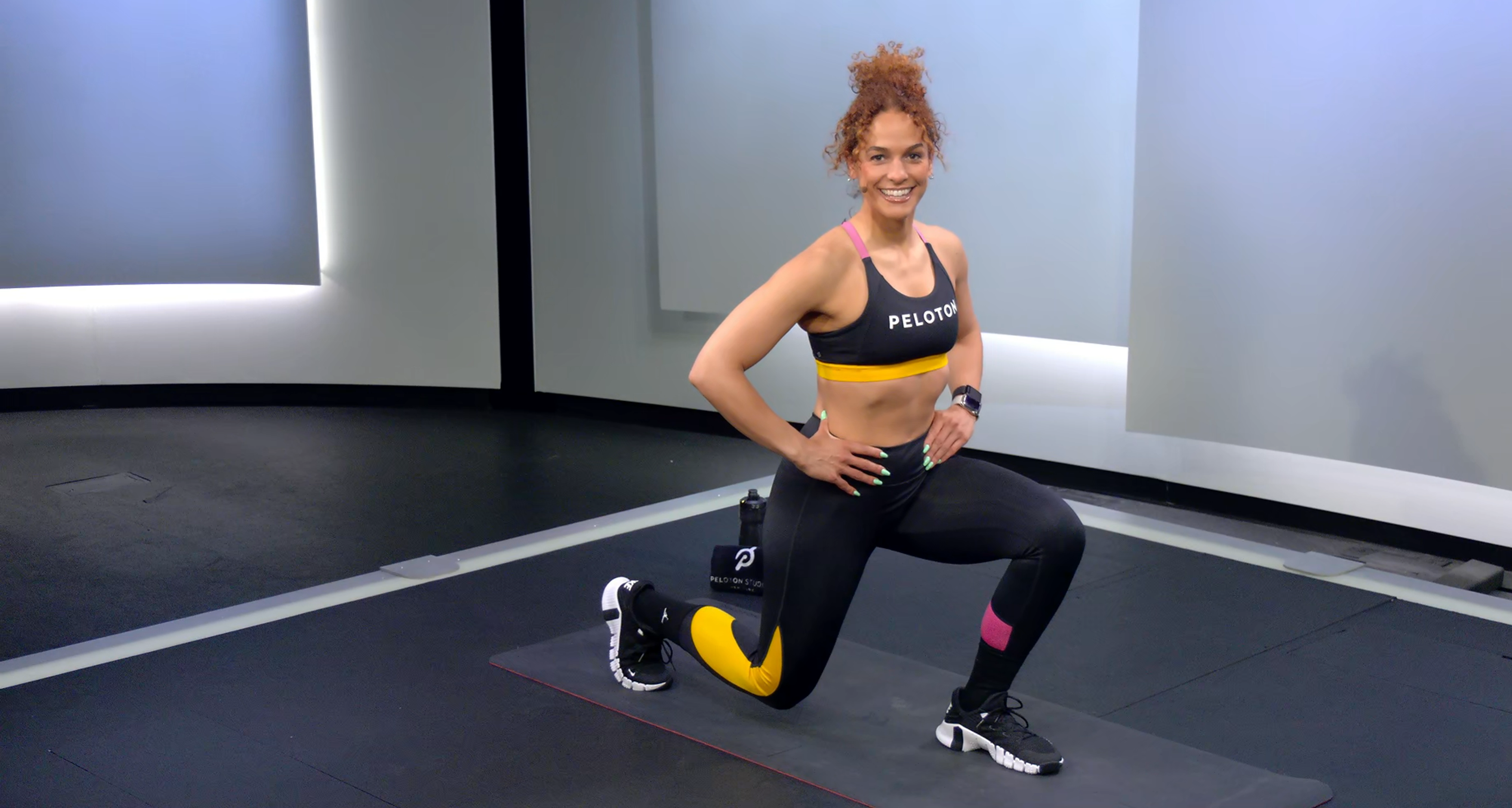 Woman does a lunge, a leg exercise for beginners