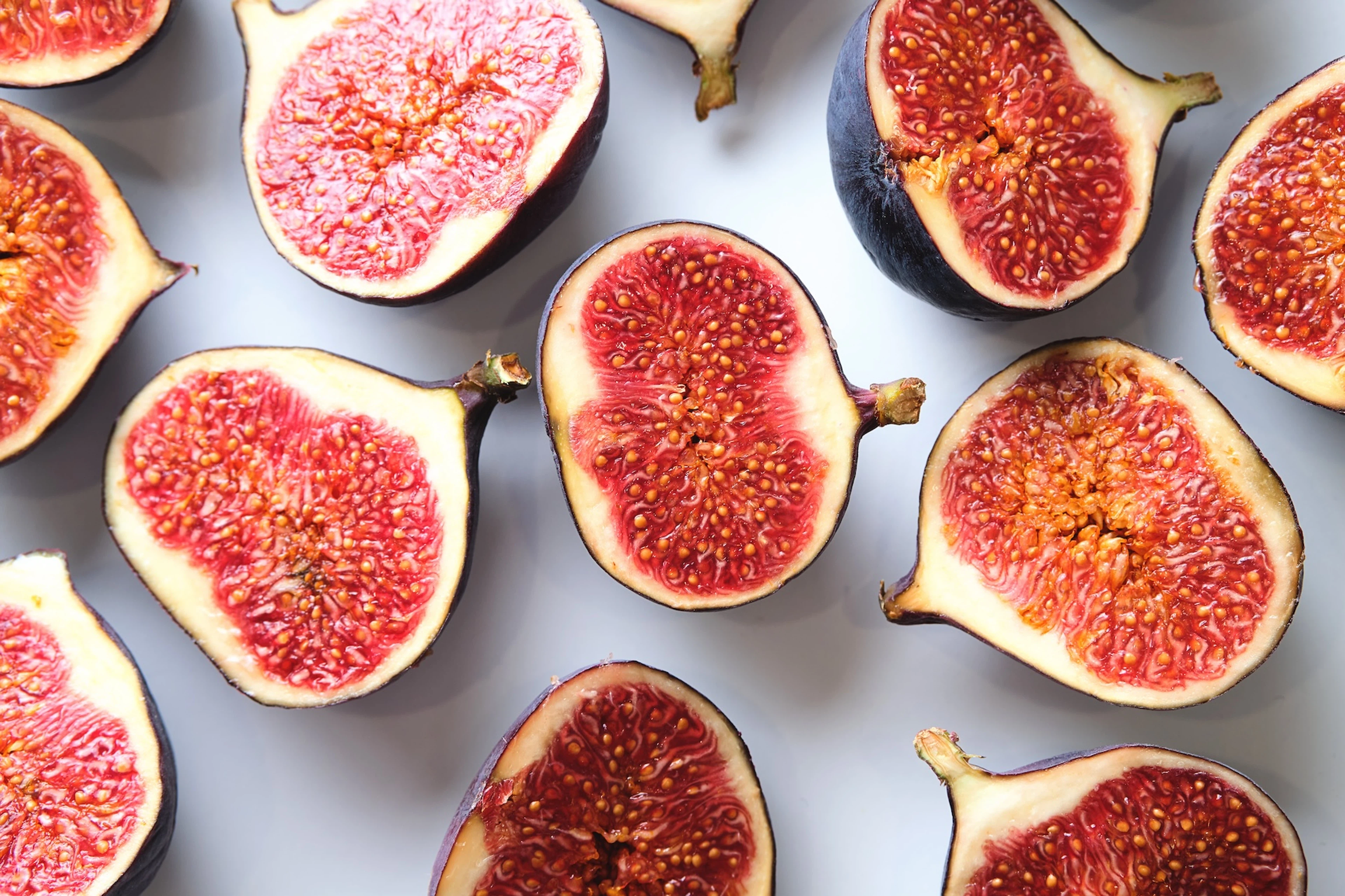 Fresh figs cut in half.