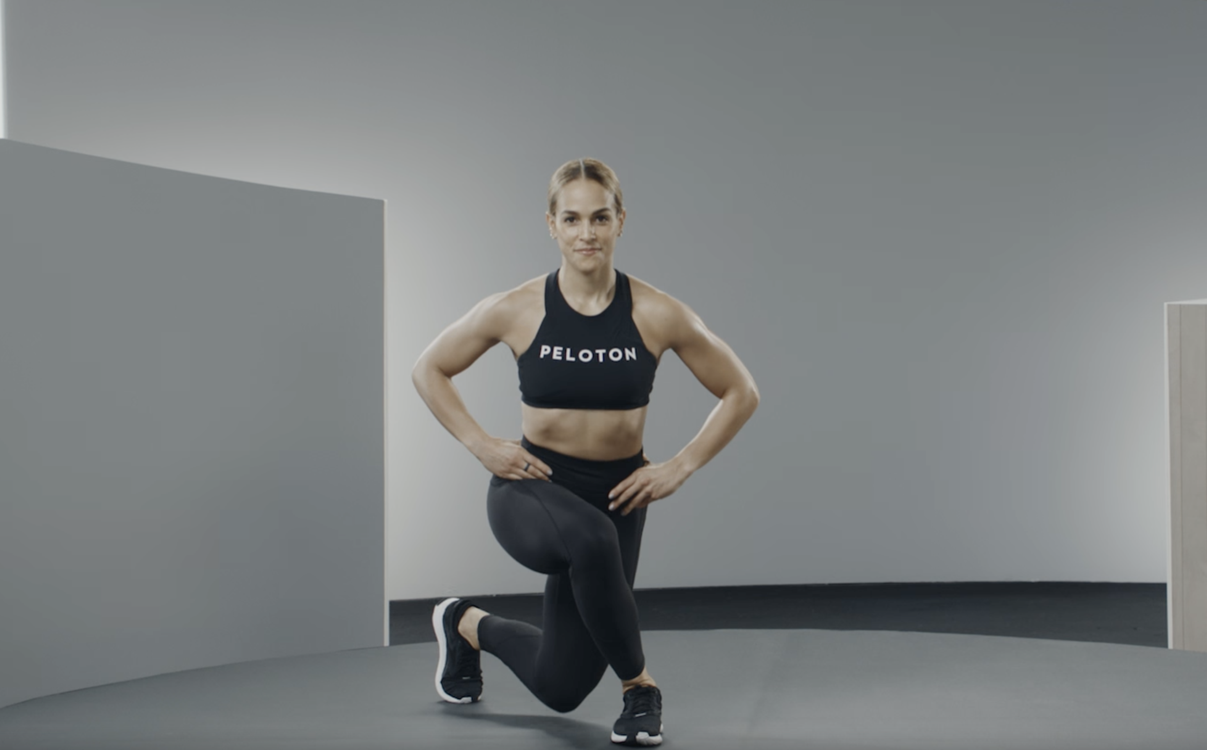 Jess Sims demonstrates a curtsy lunge