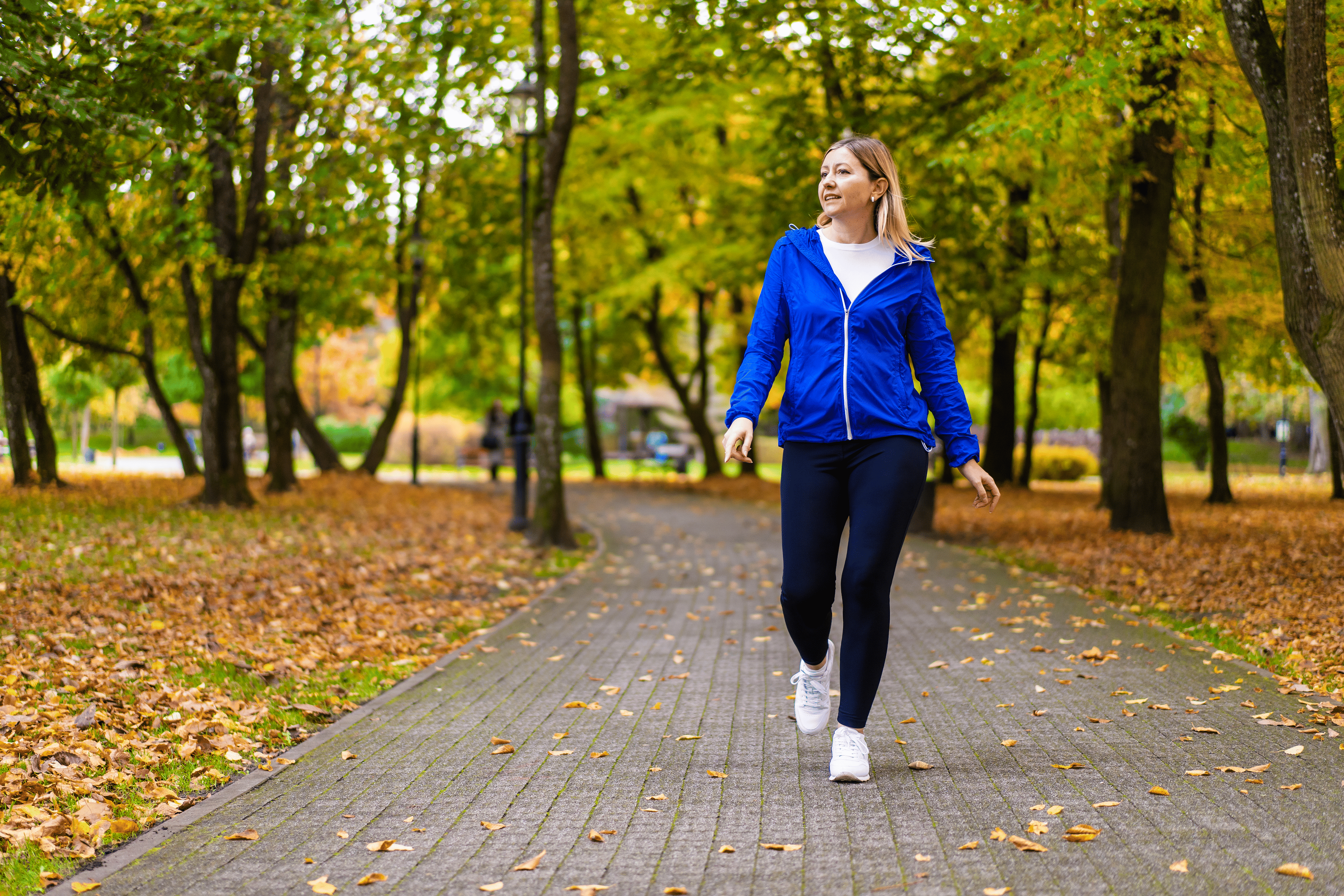 Woman walking outdoors