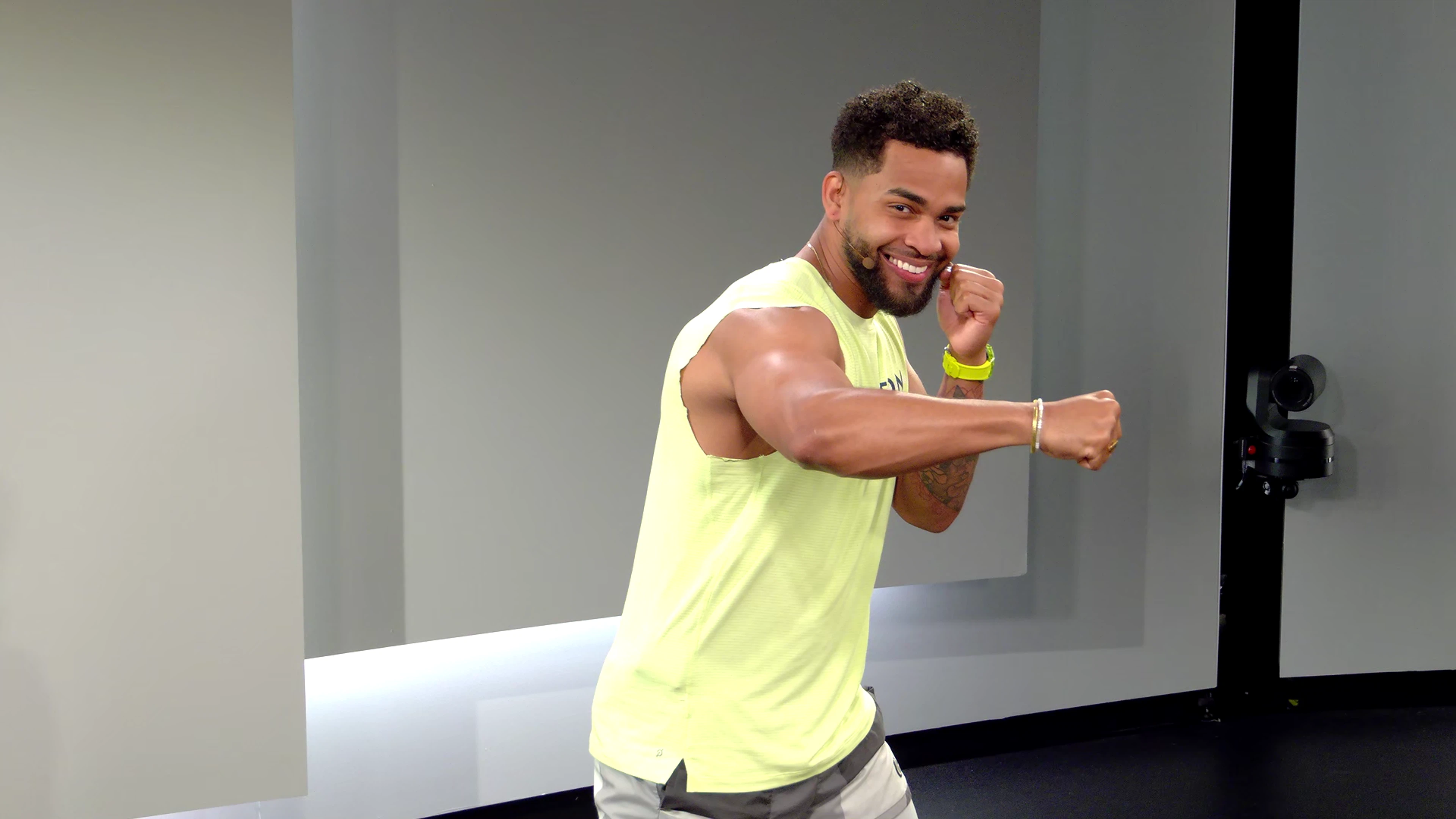 Rad Lopez demonstrates how to throw a hook in boxing Peloton class