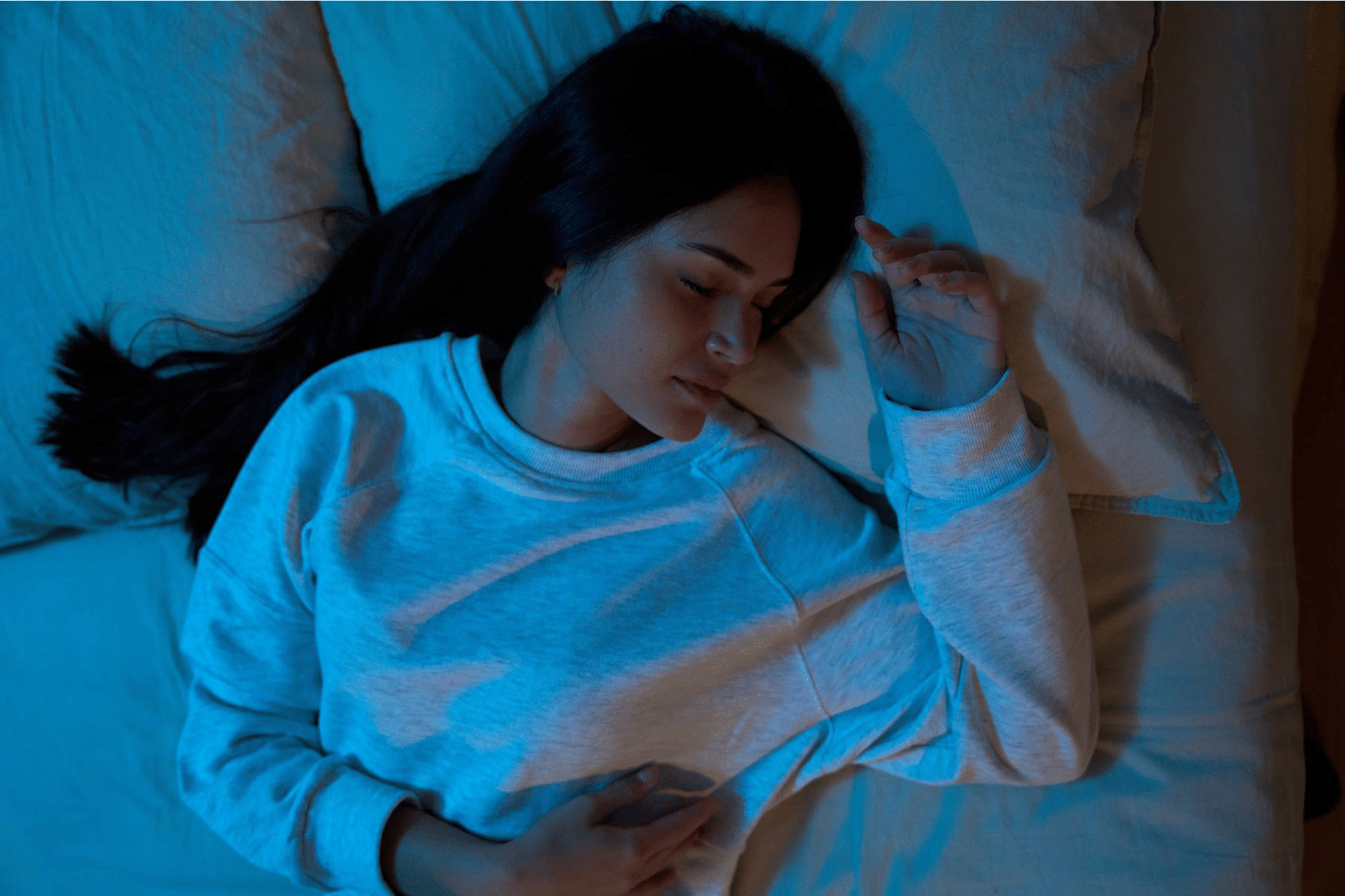 Woman asleep in bed