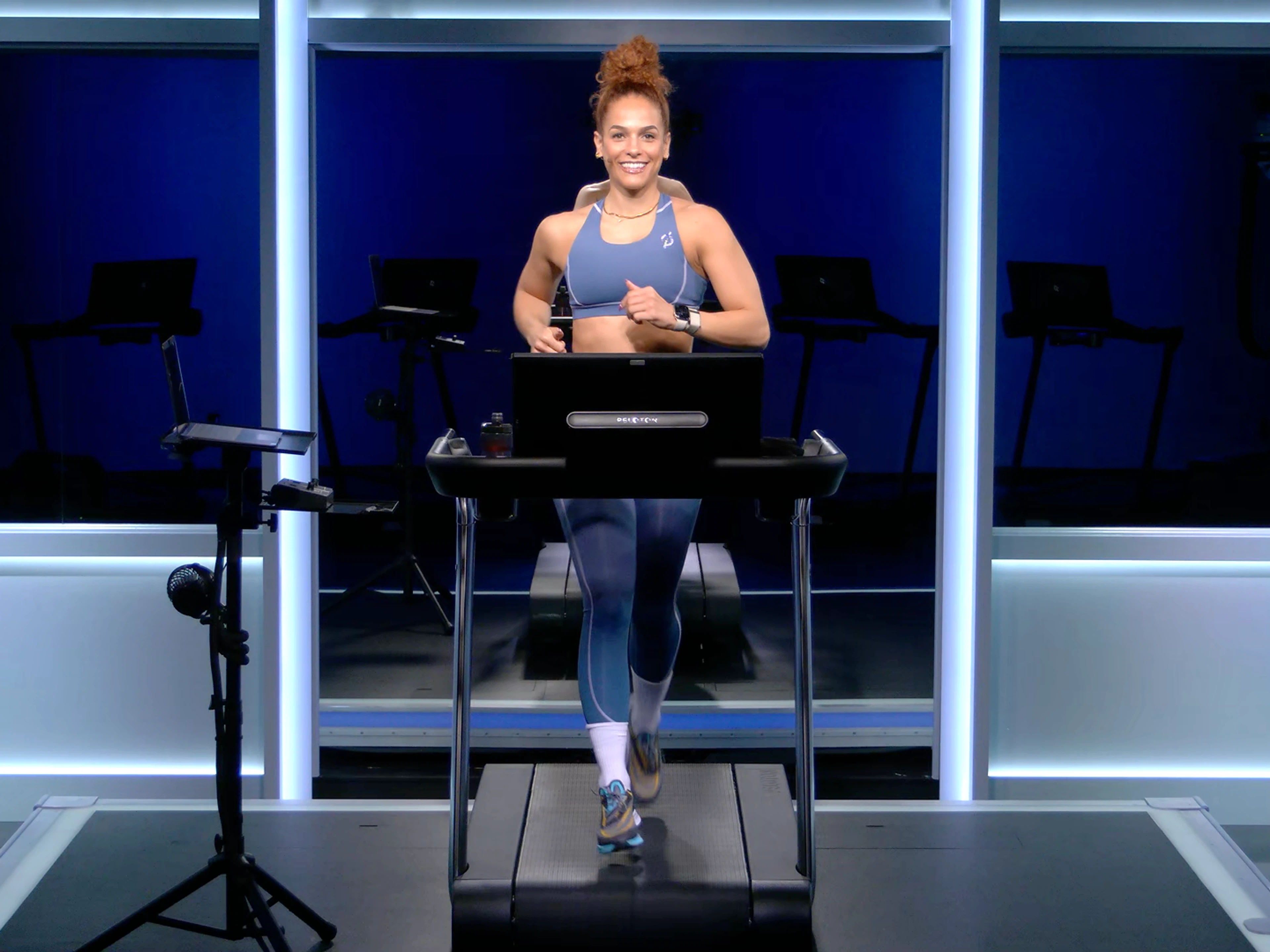 Jess Sims running on Tread in Peloton Studios