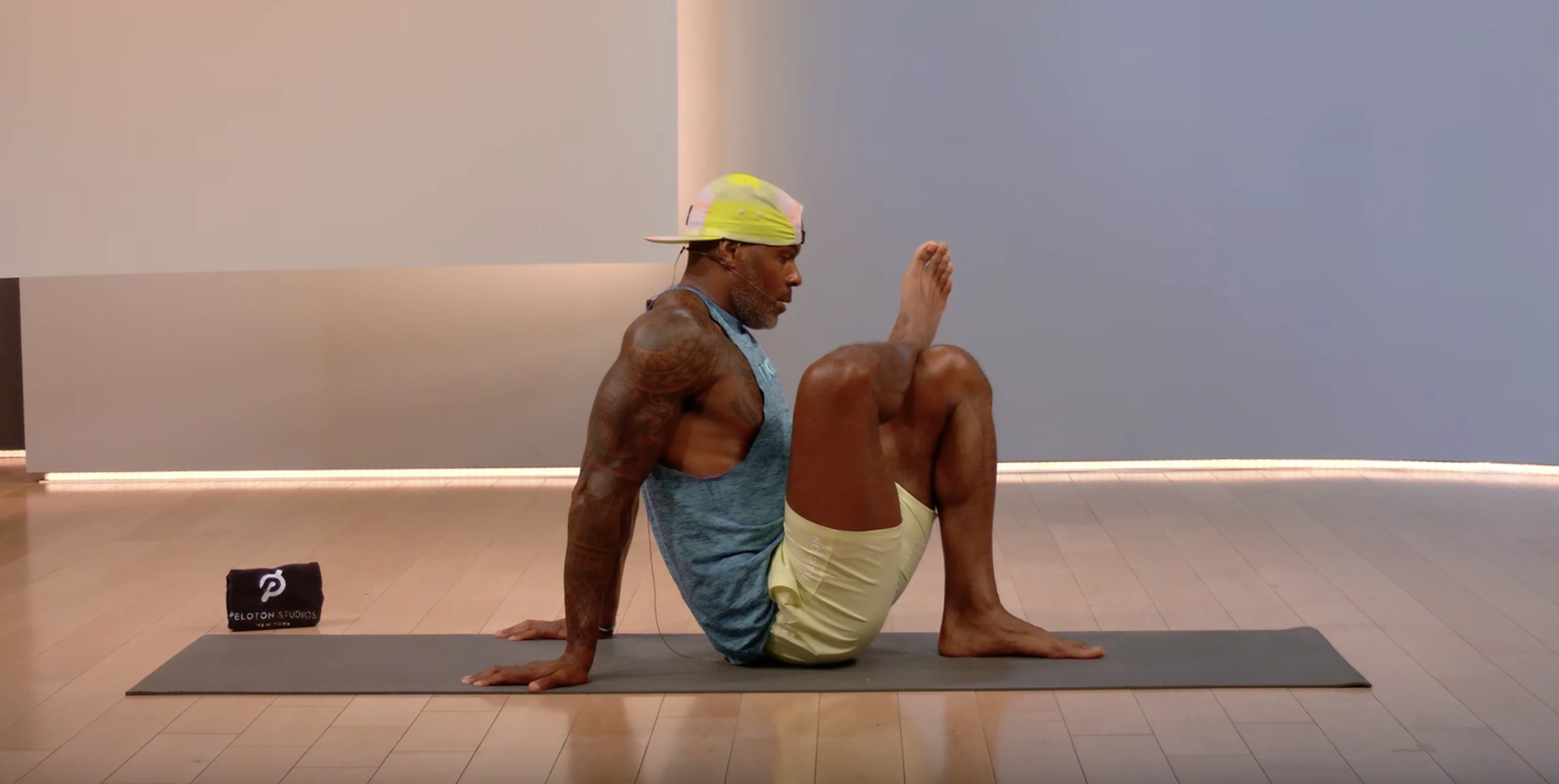 Adrian Williams does a seated Piriformis stretch