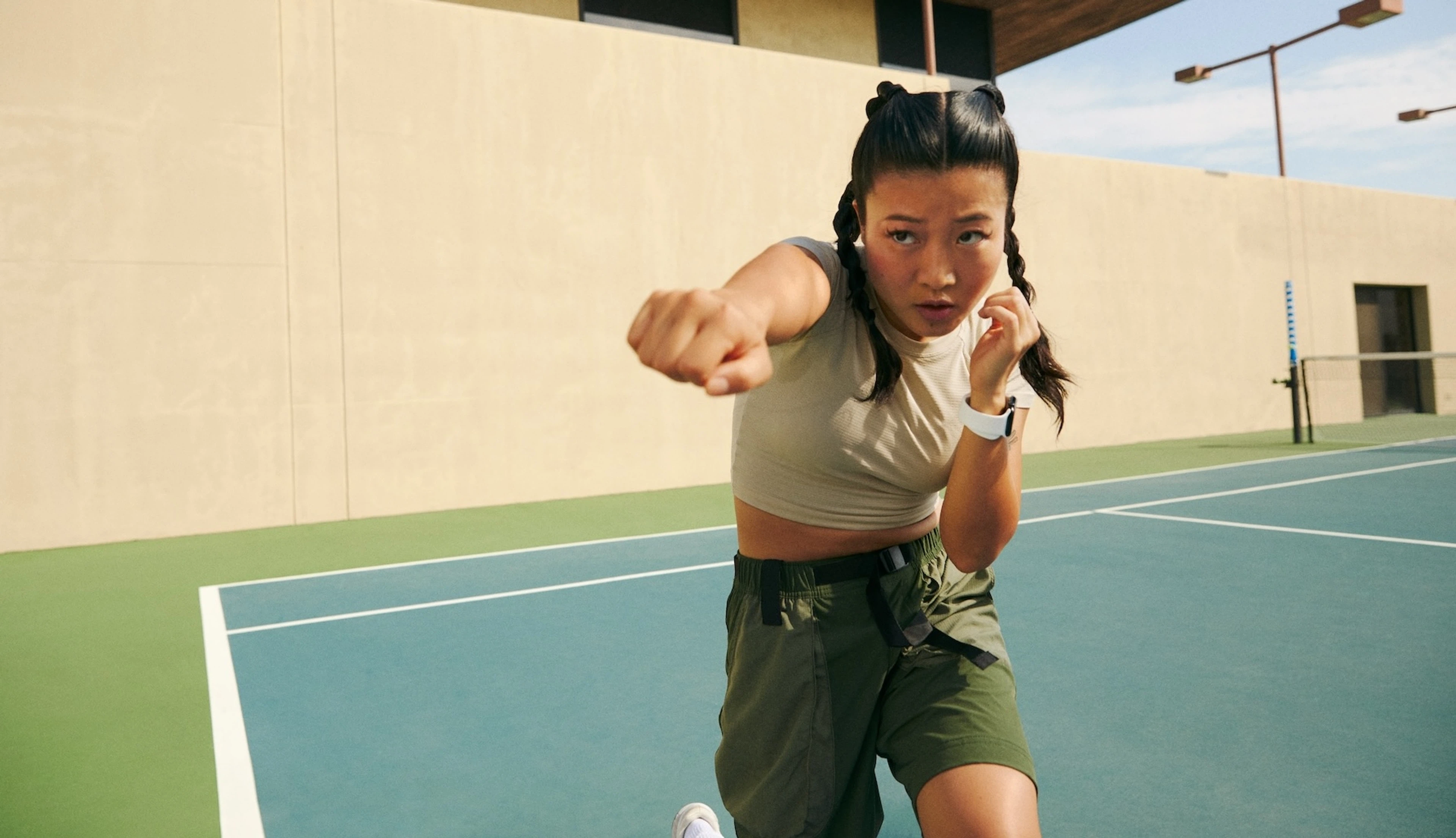 Woman doing a cardio workout with Peloton