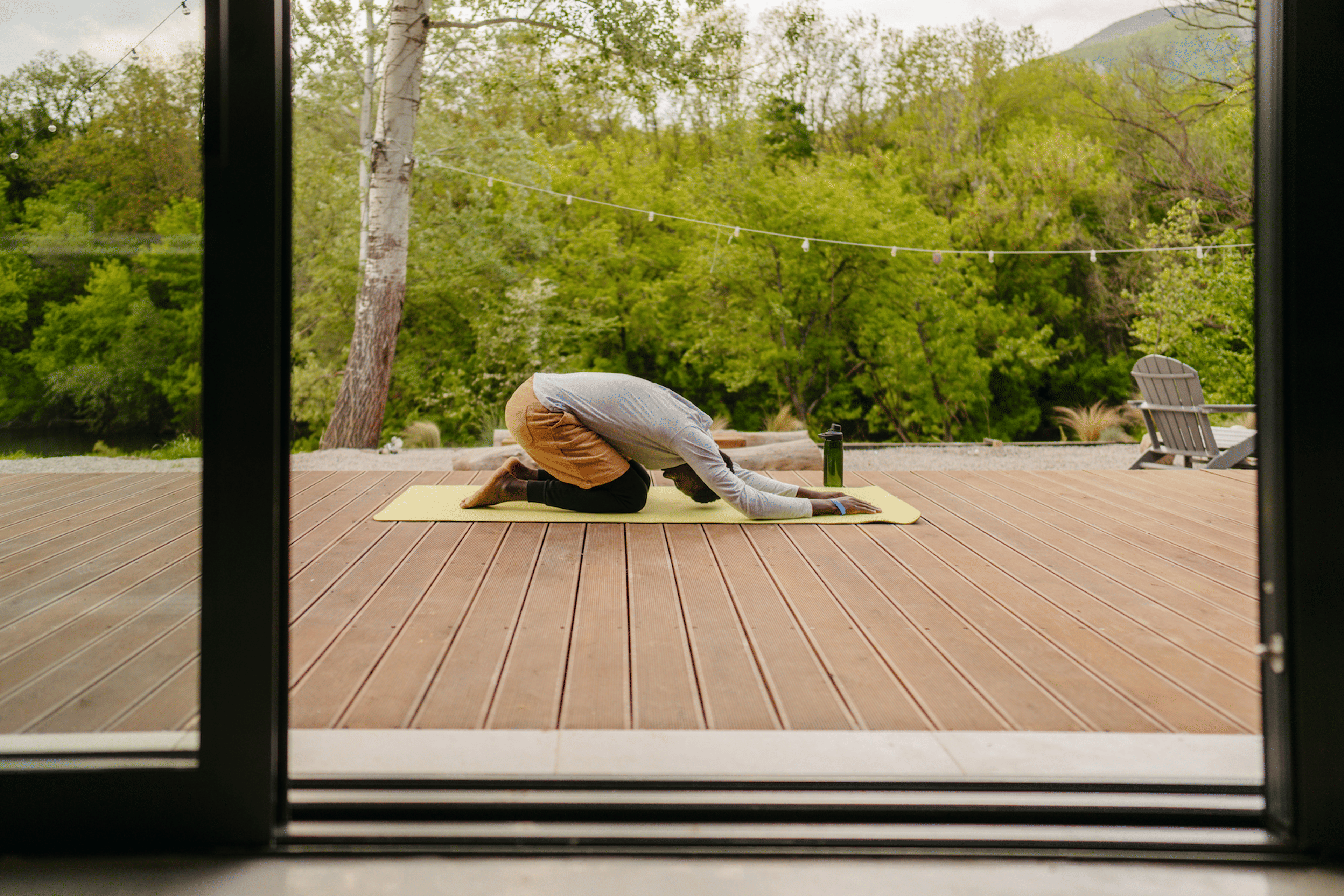 Man does Child's Pose, yoga for relaxation