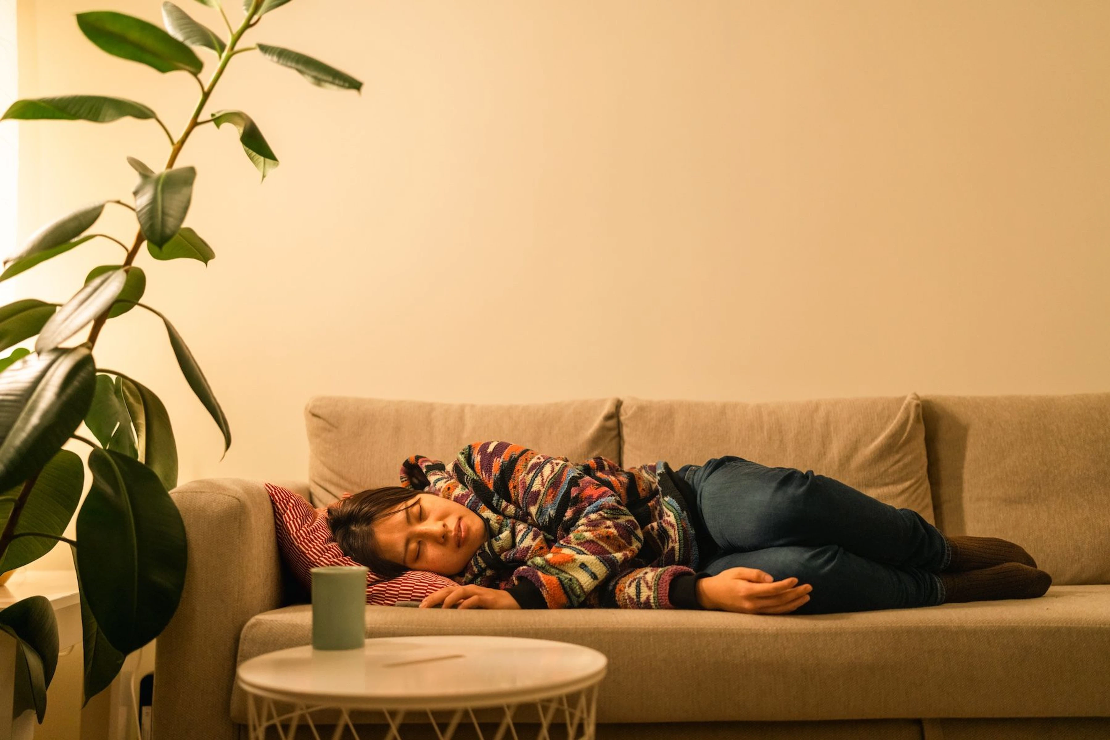Woman resting on couch