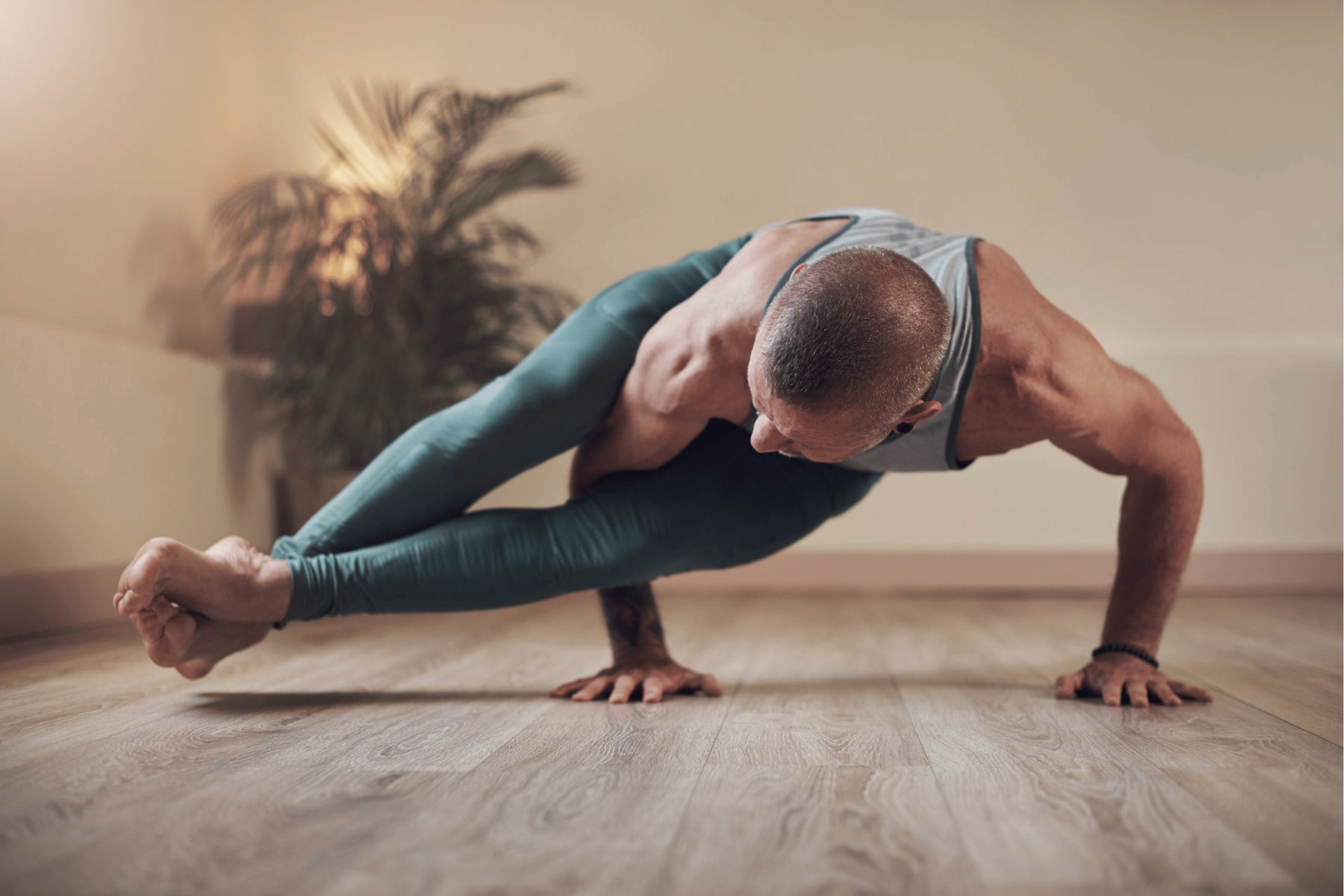 Man demonstrating Eight Angle Pose