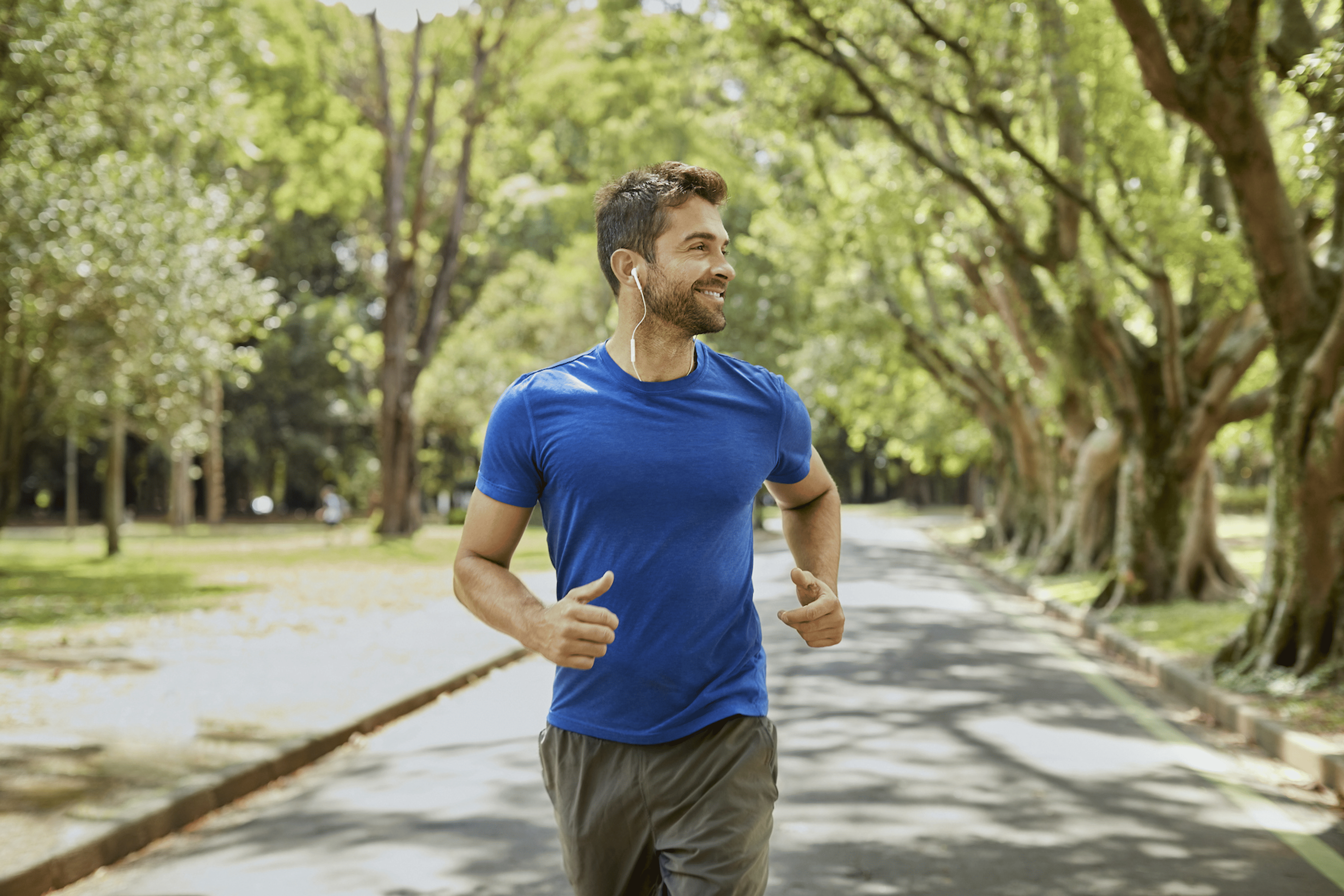 man running leisurely outdoors