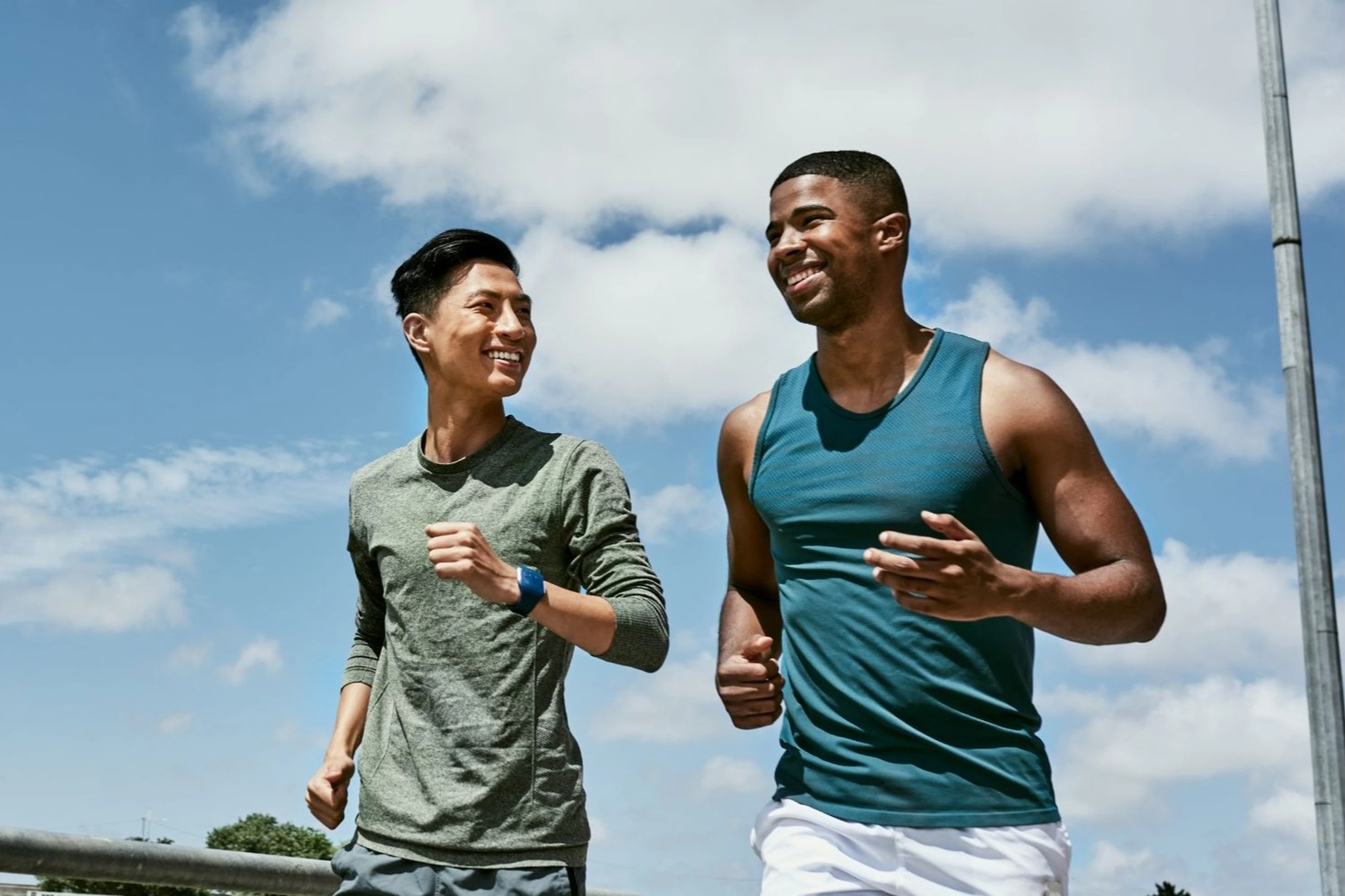Two men jogging outside