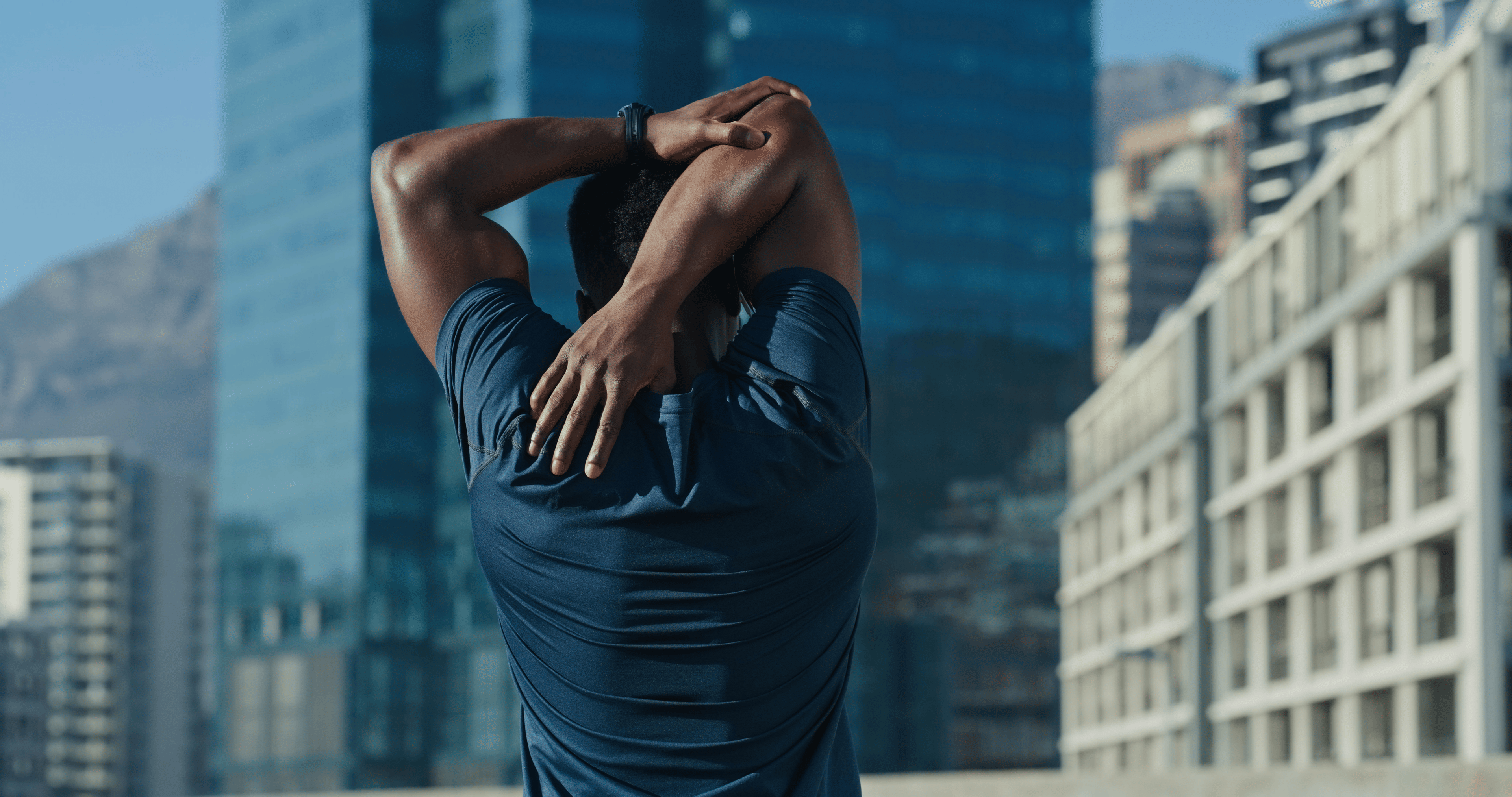 Man stretches upper body