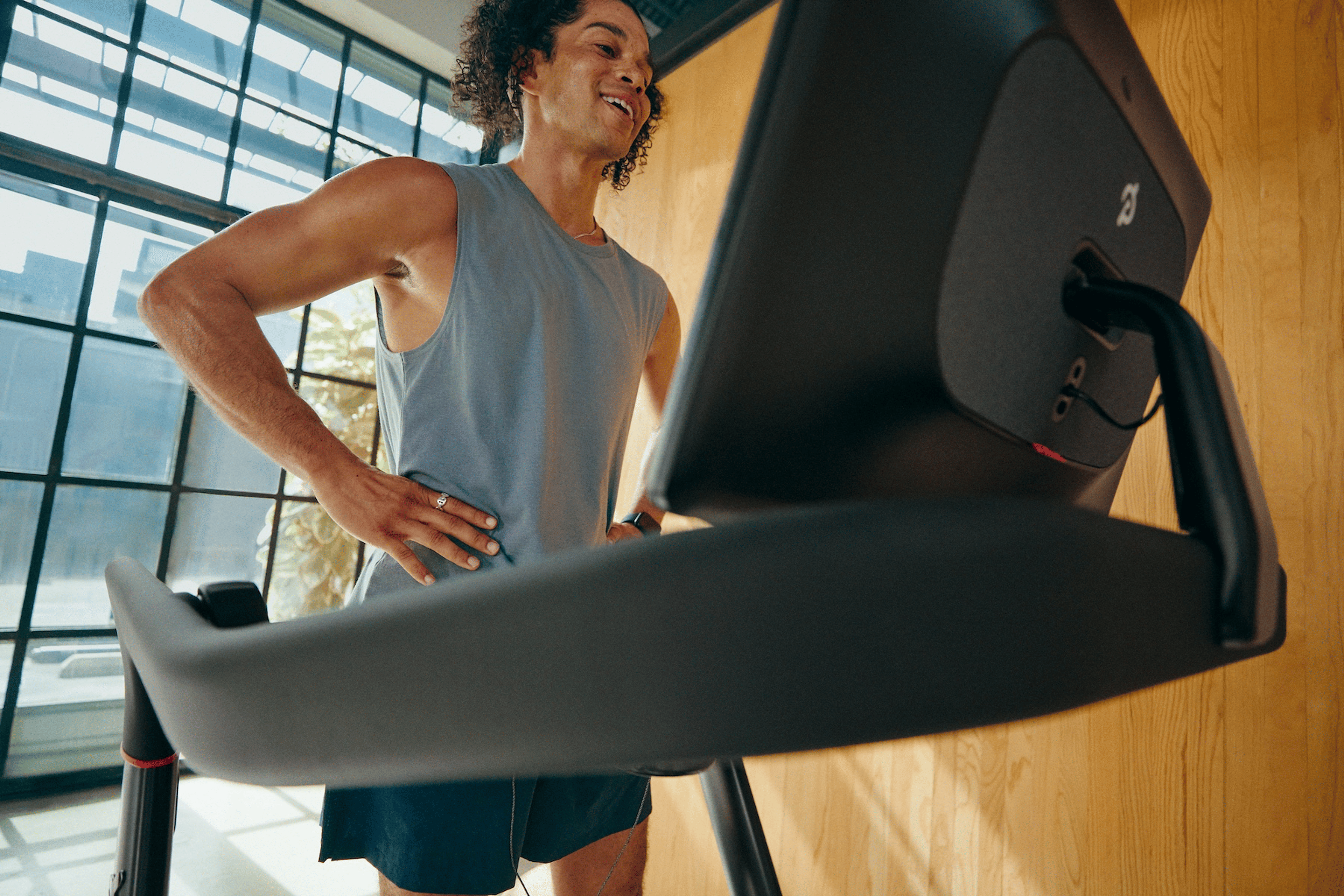 Man running on Peloton treadmill