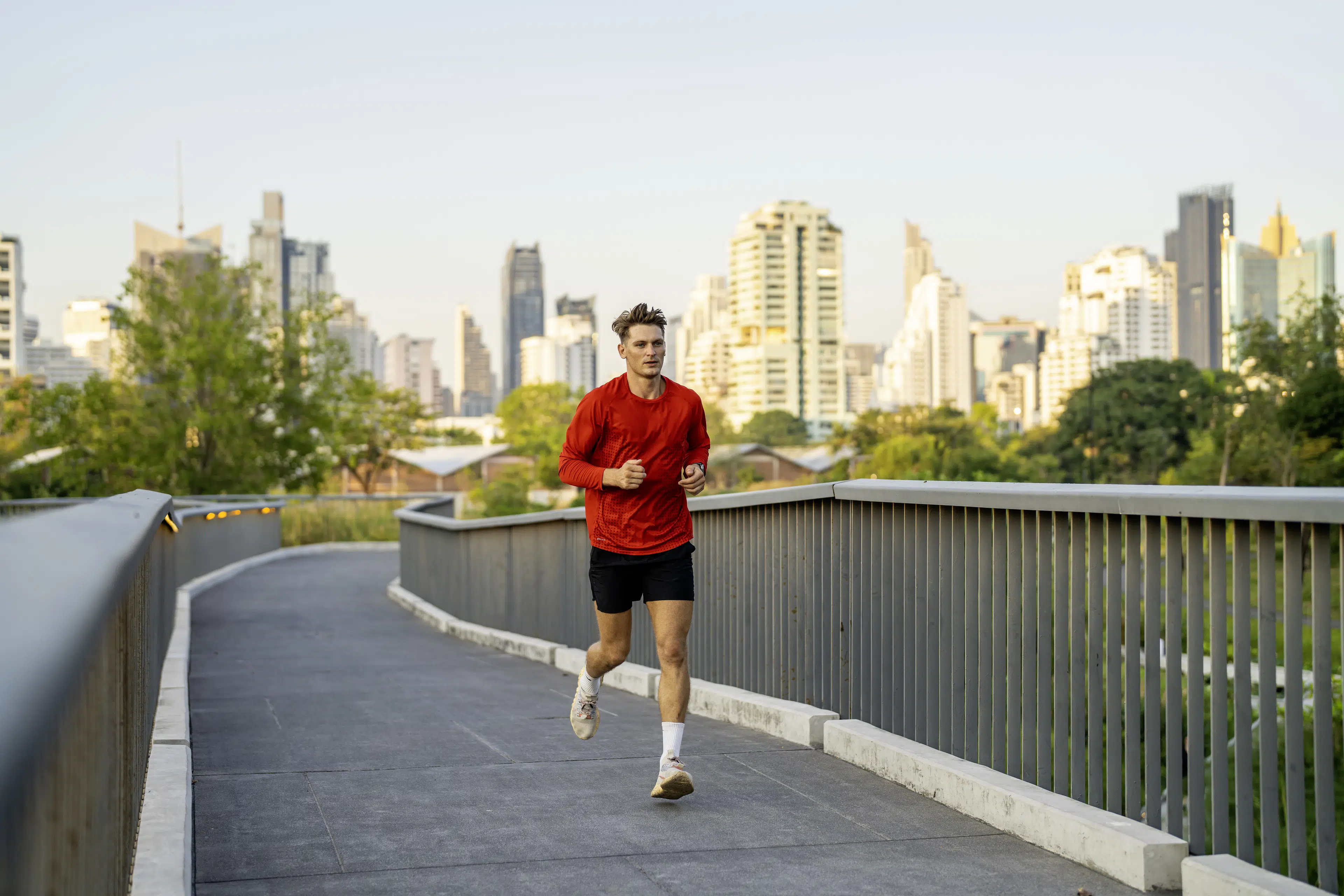 Man running outdoors, an example of a Zone 3 cardio workout