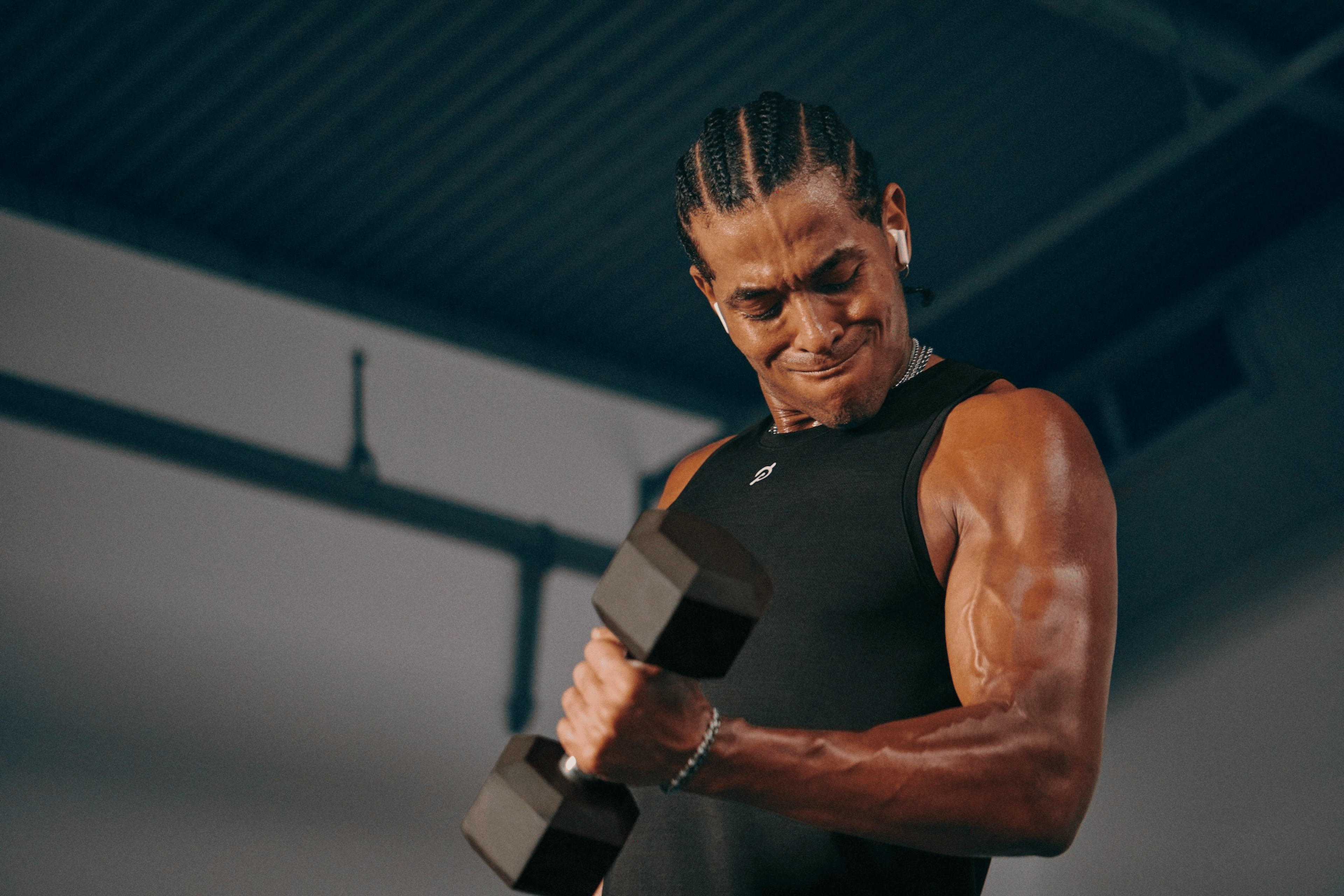 man doing biceps curl