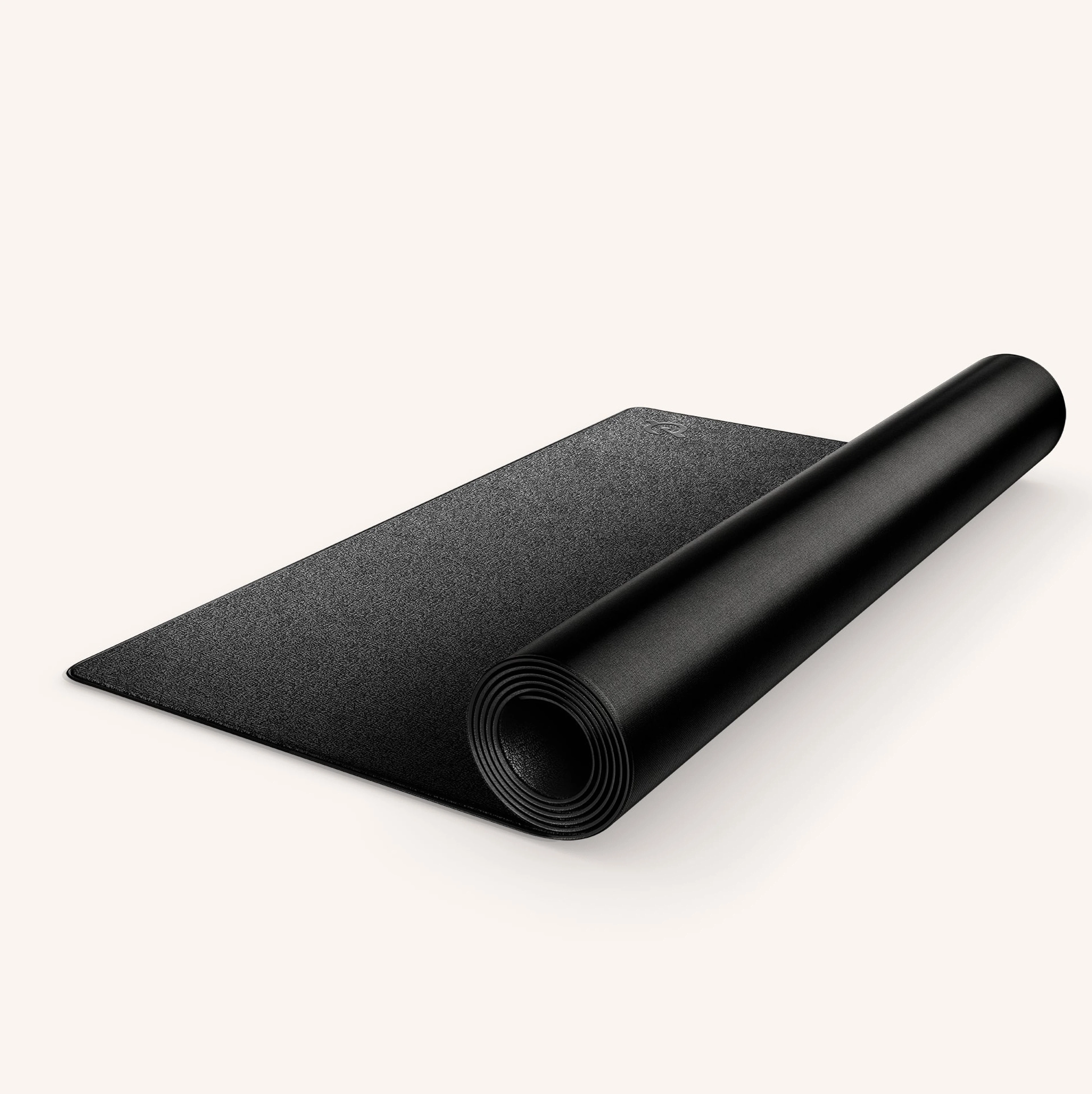 A black Peloton Bike mat as part of a list of Peloton Bike accessories.