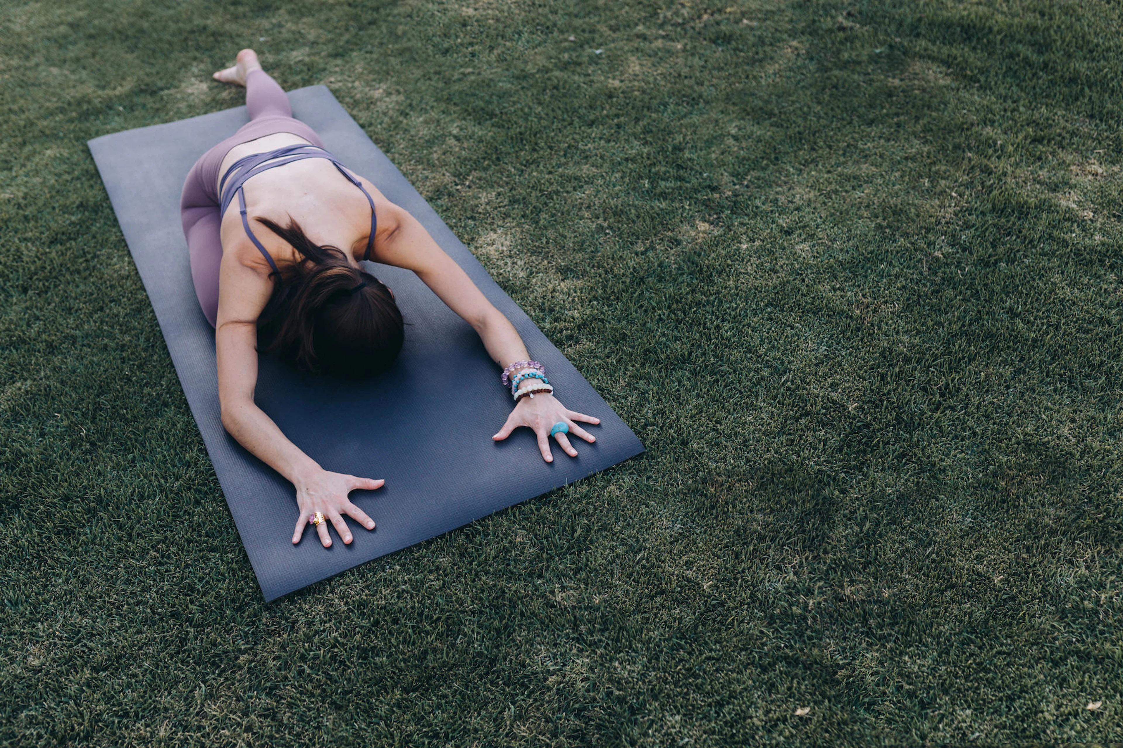 Woman does pigeon pose